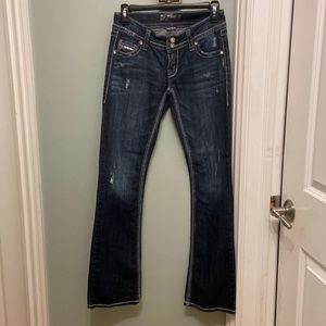 Silver jeans boot, cut with little fake rips